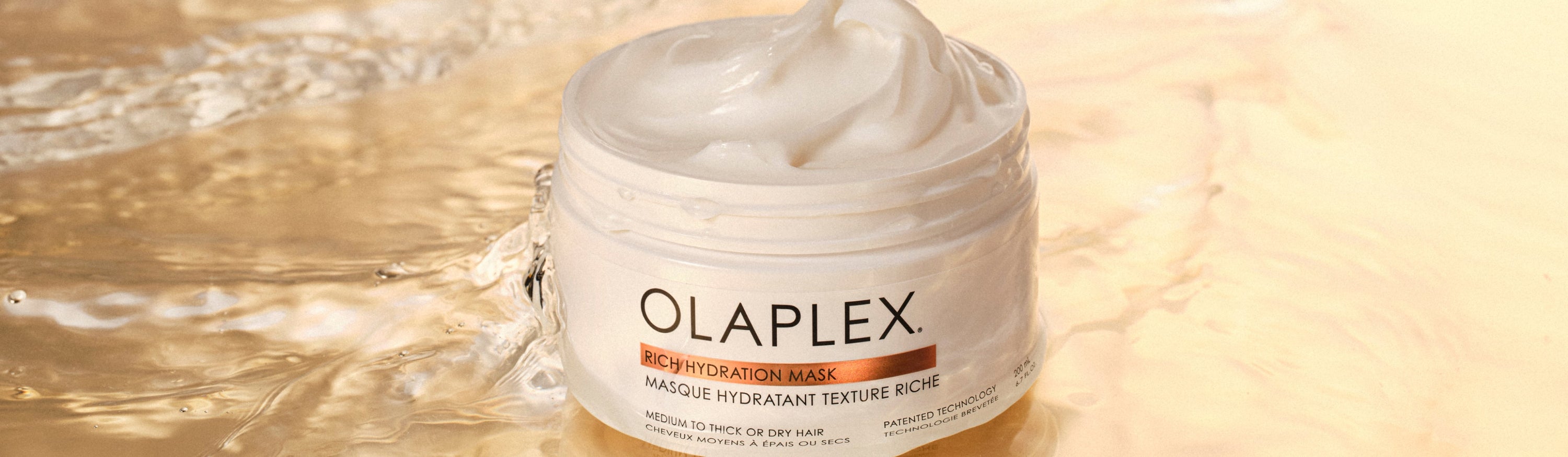 Open Rich Hydration Mask Container surrounded by water 