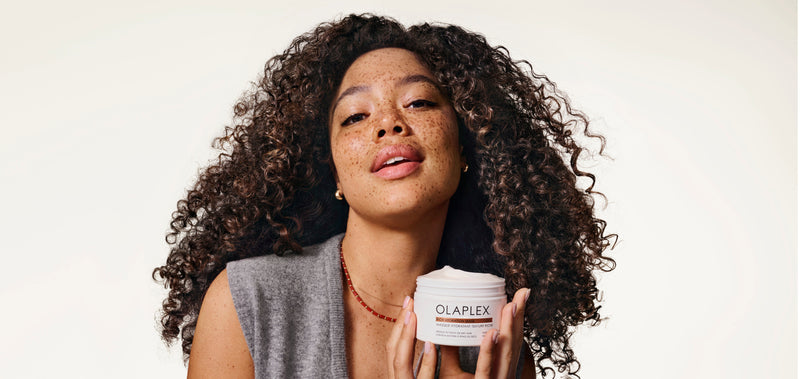 Woman holding the Rich Hydration Mask