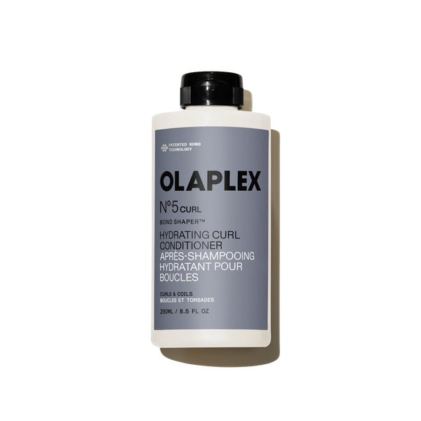Bouteille de l'Olaplex N°.5CURL Bond Shaper Hydrating Curl Conditioner 250 ml sur fond blanc uni. - main view