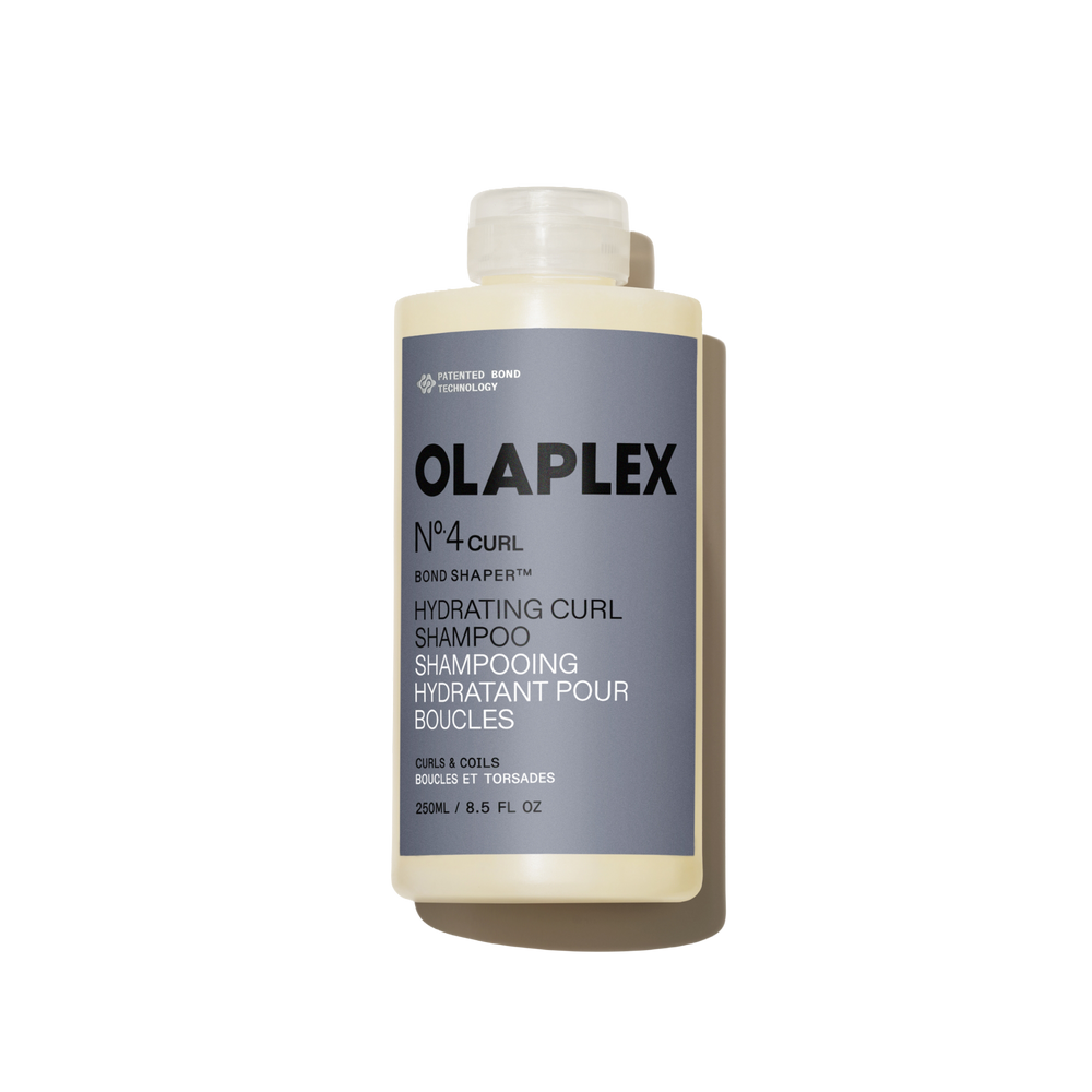 Bouteille de l'Olaplex N°.4CURL Bond Shaper Hydrating Curl Shampoo 250 ml sur fond blanc uni - main view