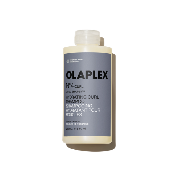 Bouteille de l'Olaplex N°.4CURL Bond Shaper Hydrating Curl Shampoo 250 ml sur fond blanc uni - main view