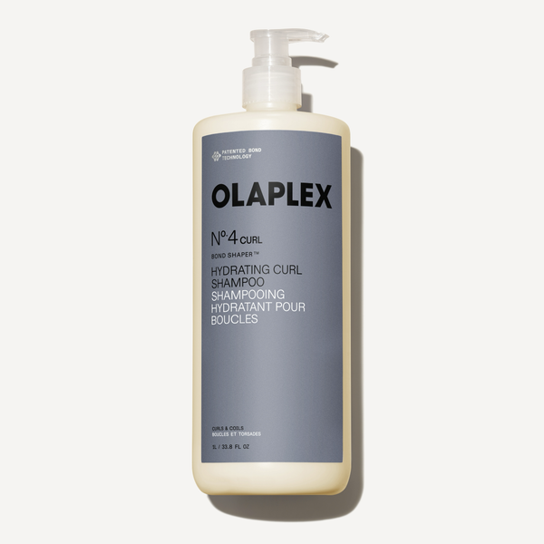 Bouteille de l'Olaplex Nº.4CURL Bond Shaper Hydrating Curl Shampoo 1000 ml sur fond blanc uni. - main view