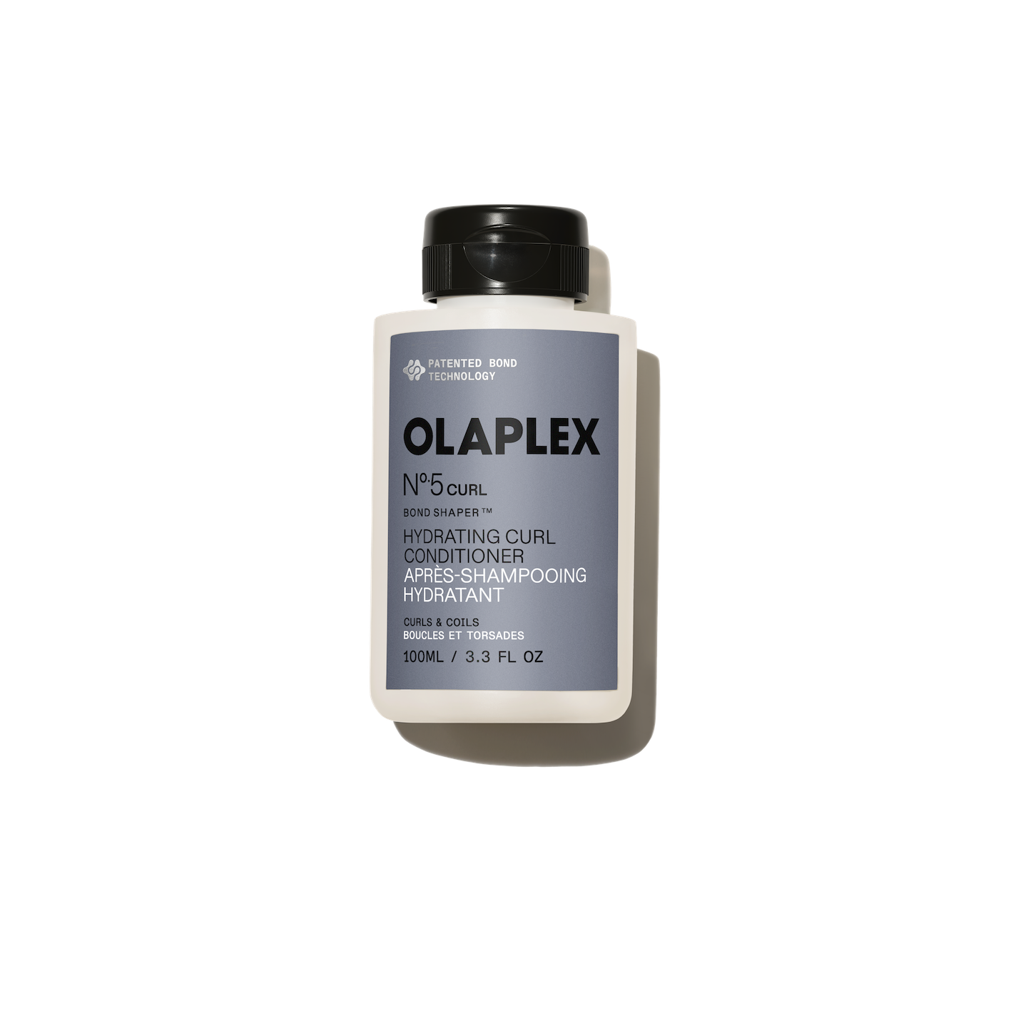 Bouteille de l'Olaplex N°.5CURL Bond Shaper Hydrating Curl Conditioner 100 ml sur fond blanc uni.