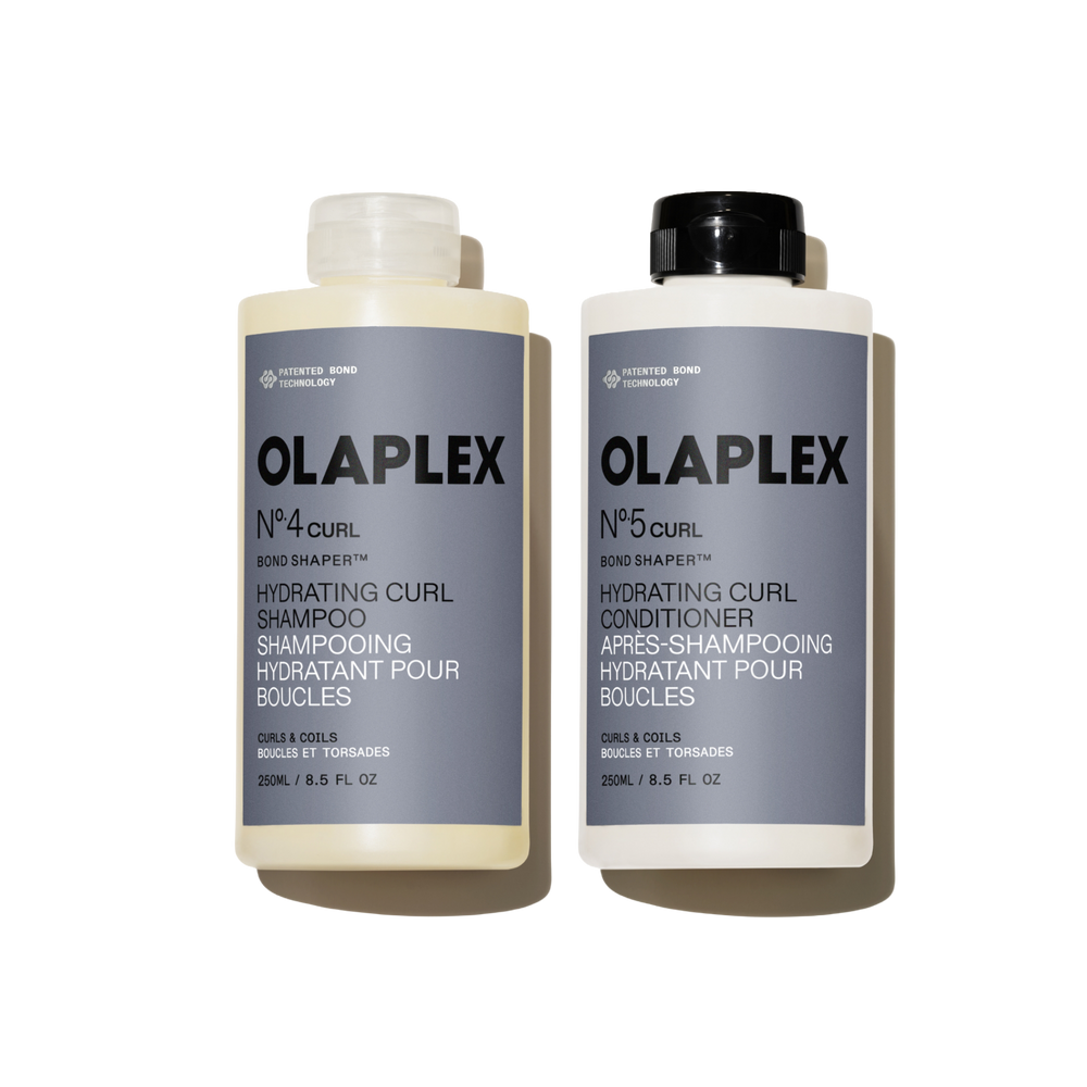 OLAPLEX Nº.4CURL Shampooing Hydratant pour Boucles et Nº.5CURL Revitalisant Hydratant pour Boucles 250ML duo sur un fond transparent. - main view