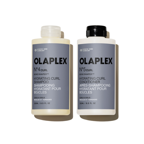 OLAPLEX Nº.4CURL Shampooing Hydratant pour Boucles et Nº.5CURL Revitalisant Hydratant pour Boucles 250ML duo sur un fond transparent. - main view